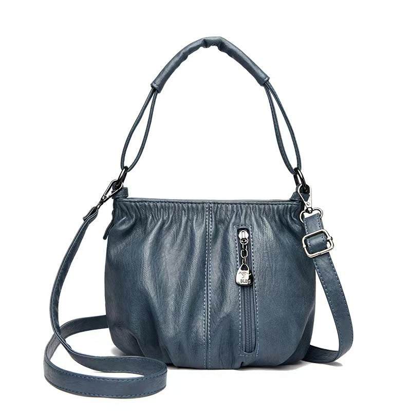 🥳2026 MEGA-AANBIEDING!💞Modieuze Eenvoudige Casual Geplooide Zachte PU Leren Schoudertas – NU 50% KORTING! 💼👜