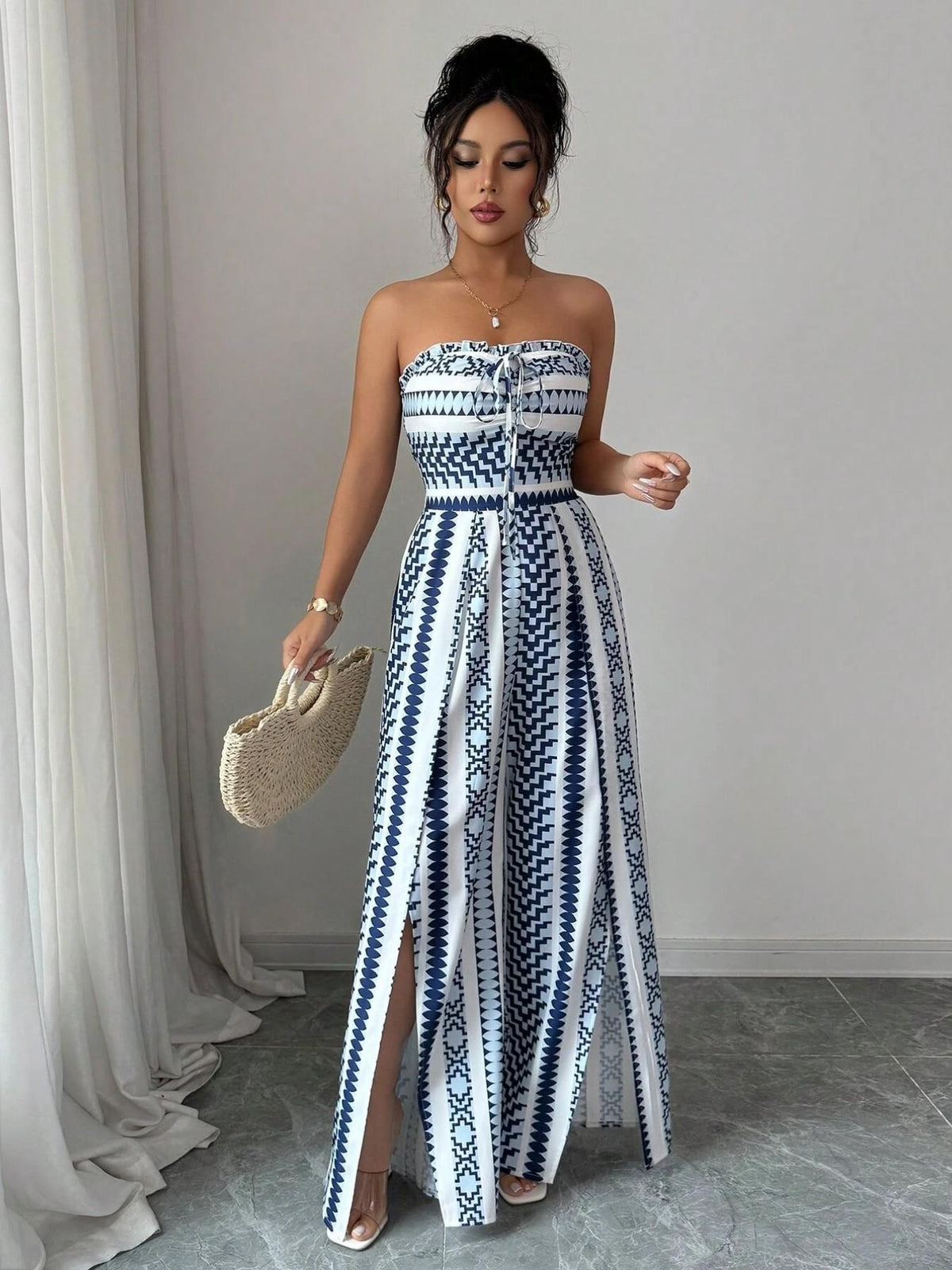 👗💙 Geometrische Jumpsuit met halterhals & zijsplit –  Perfect voor strand, kantoor & avond. 🔥✨