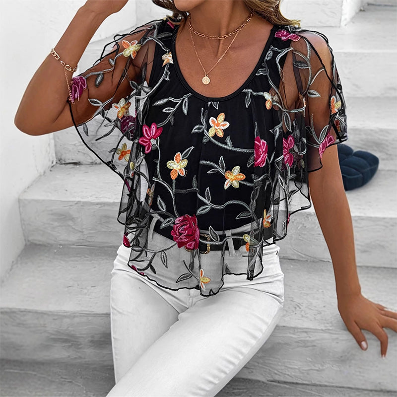 Damestop met print van mesh en patchwork