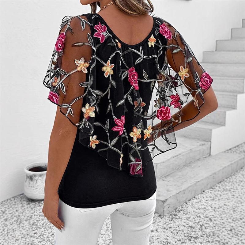 Damestop met print van mesh en patchwork