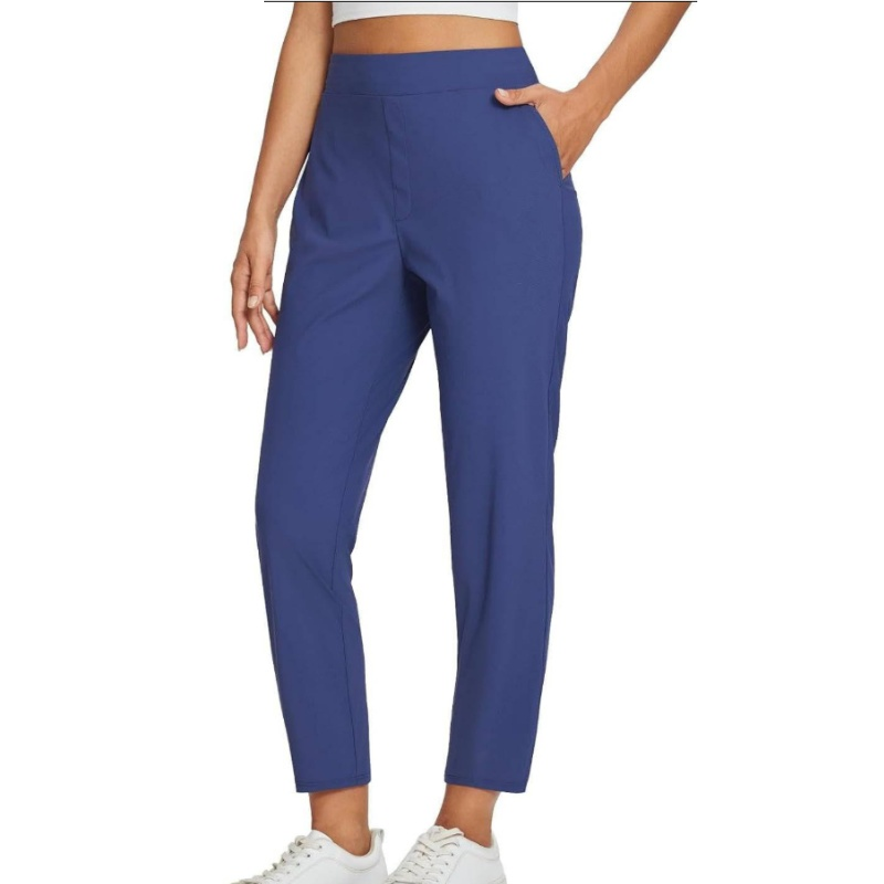 Hoge elastische broek voor dames met zakken met ritssluiting