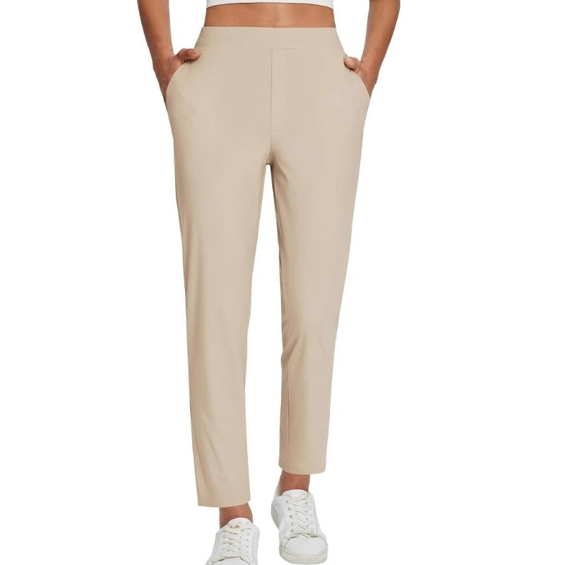 Hoge elastische broek voor dames met zakken met ritssluiting