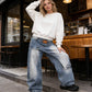 Dames jeans met asymmetrische taille en wijde pijpen