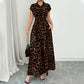 👗 Elegante damesjurk met revers en luipaardprint