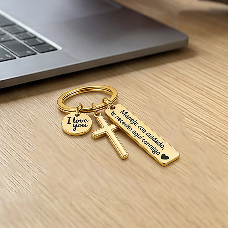 🔥1 kopen, 1 gratis🎉 Roestvrijstalen sleutelhanger in de vorm van een kruis – ‘Rijd veilig’-wens❤️🙏