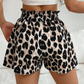 🩳 Damesshort met hoge taille en losse pasvorm, voorzien van een trekkoord