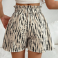 🩳 Damesshort met hoge taille en losse pasvorm, voorzien van een trekkoord